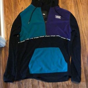 Purple and green vans pull over jacket